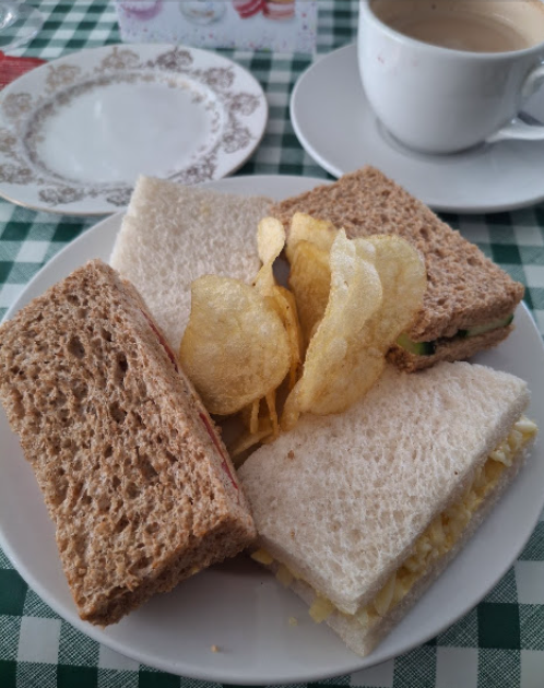 Sandwich served with crisps on the side