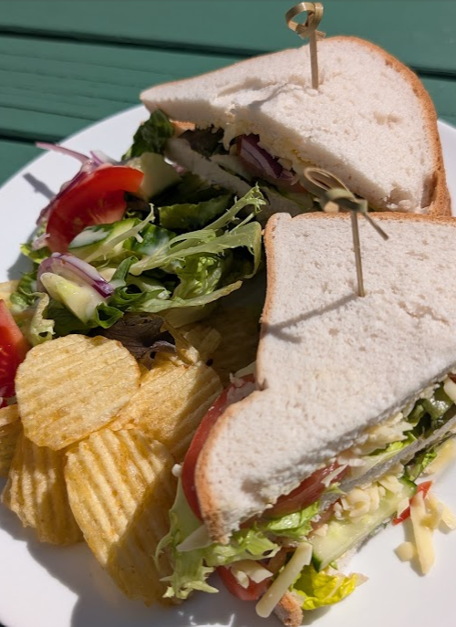 Piping hot fish finger sandwich, a Cafe Mews favourite